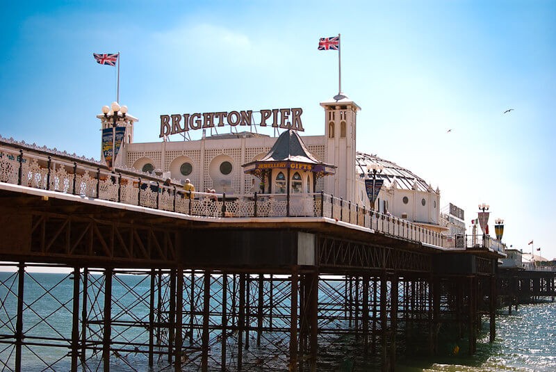 Brighton pier on a sunny day with blue skies