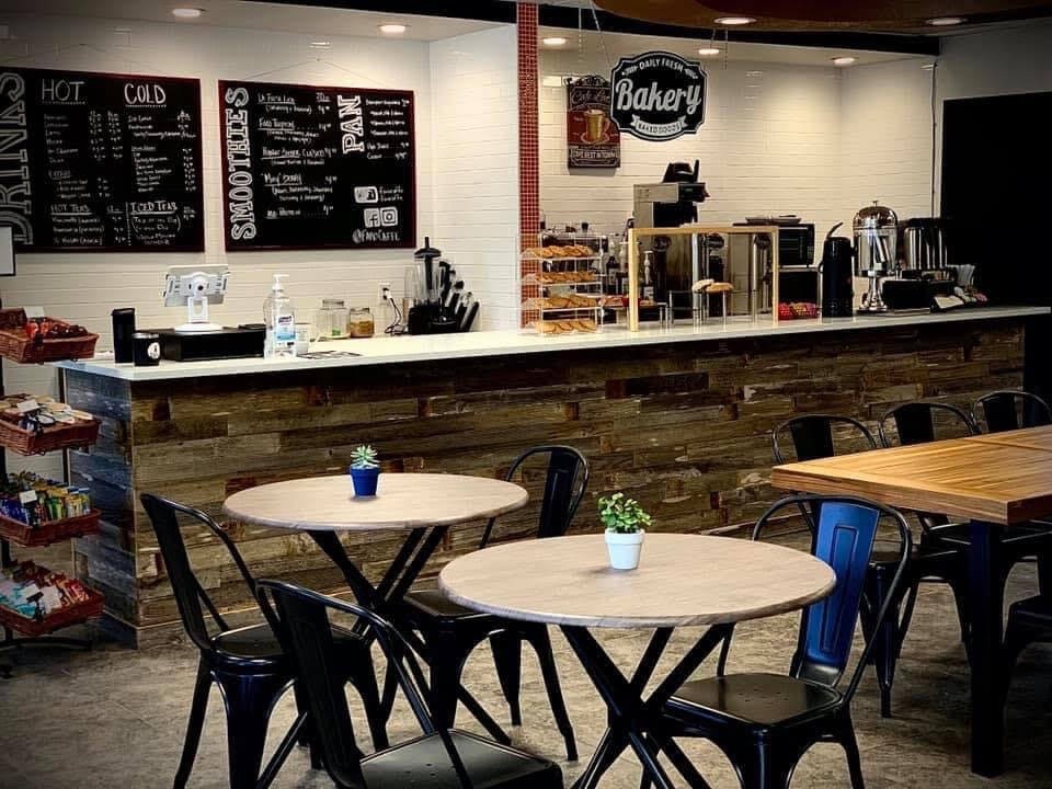 faro coffee shop and bakery with empty seats and tables