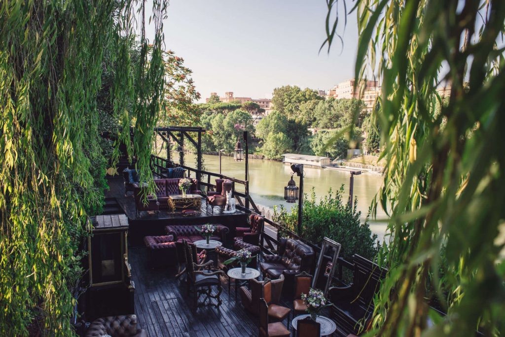 magick bar al fresco with empty seats and tables