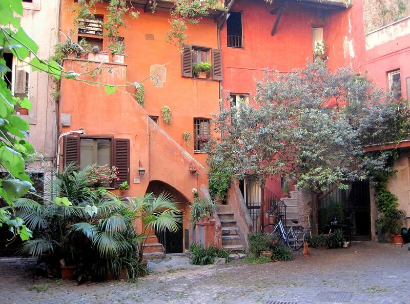 arco degli acetari orange colored homes hidden gems in rome