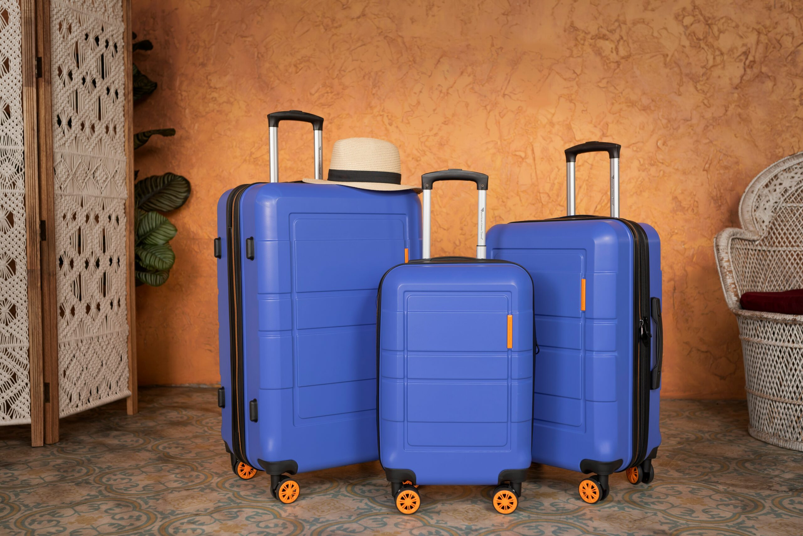 3 blue suitcases