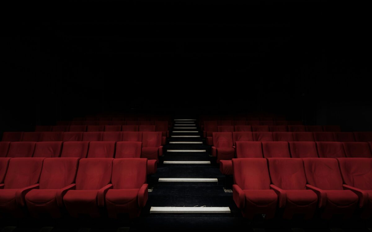 Rows of red seats in a cinema