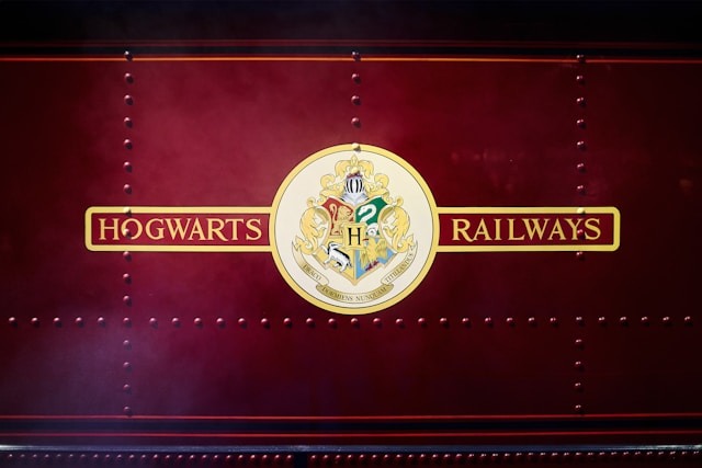 A photo of a side of a train that says 'Hogwarts Railways'